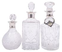 An Elizabeth II silver and glass whiskey decanter by Camelot Silverware Ltd, Sheffield 1992,