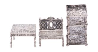 A small group of Continental silver comprising of; a miniature whatnot probably Dutch,