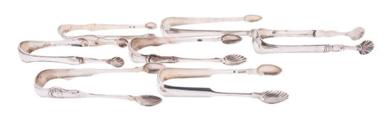 Six Scottish silver sugar tongs comprising of: one provincial by Thomas Davie,