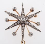 A diamond star brooch, a star brooch set with a mixture of old mine-cut and rose-cut diamonds,