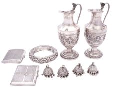 A pair of late 19th century Indian colonial silver plated ewers, not marked,