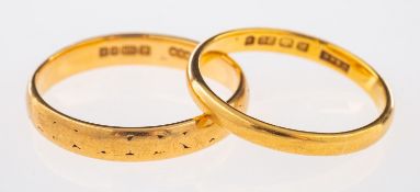 Two 22ct wedding bands, both D-shaped, UK hallmarked, sizes L 1/2 and K, total gross weight 4.