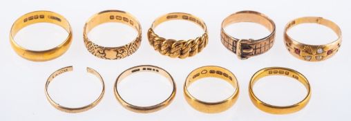 A group of various rings including three 22ct gold wedding bands, total gross weight 11.