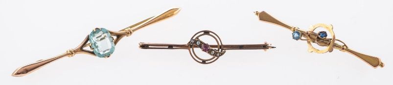 A group of three brooches,