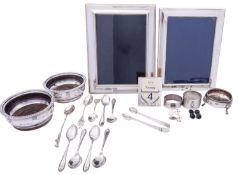 A mixed group of silver comprising of; a pair of Elizabeth II bottle coasters by P H Vogel & Co,