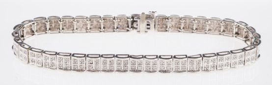 A double-row diamond bracelet of square articulated links,set with two rows of single-cut diamonds,