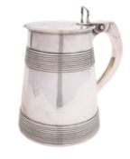 A George III silver tankard by William Holmes & Nicholas Dumee, London 1774,