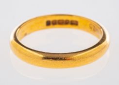 A 22ct gold wedding band, of 'D' shape, UK hallmark, size K to L, 4.1grams.