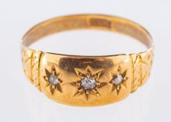 A gypsy set ring, set with three old-cut diamonds, marked 18ct, partial hallmark, size N, 2.5grams.
