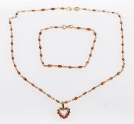 A garnet necklace, pendant and bracelet,