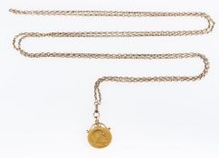 A sovereign and chain, an Edward VII 1902 full sovereign attached to scroll pendant mount, 8.
