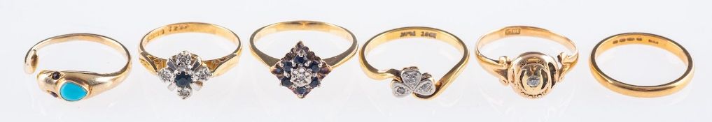 A group of six rings, including four gem-set rings, sapphire & diamond set,
