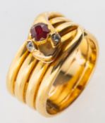 A Victorian snake ring, a coiled snake designed ring, its head set with an oval-cut ruby,