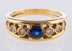 An 18ct yellow gold sapphire & diamond ring,
