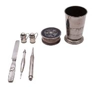 A mixed group of silver items comprising: a silver and tortoiseshell dressing table box of circular