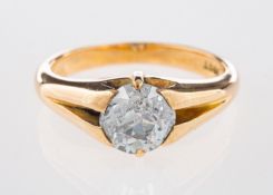 A single stone ring, set with a brilliant-cut diamond in a 'gypsy' style setting, diamond approx. 1.