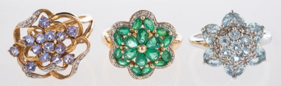 Three 9ct gold flowerhead cluster rings,