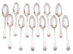 A set of twelve Georgian silver Old English pattern table spoons, maker W T, London 1768/69,