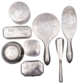 A Chinese Export silver matched dressing table set comprising: a circular box with pull off cover-9.