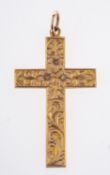 An Edwardian cross pendant, with flower and foliate engraving, UK hallmark, measuring approx. 3.