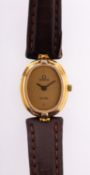 Omega De Ville a lady's wristwatch the oval dial with raised baton quarter-hour numerals and baton