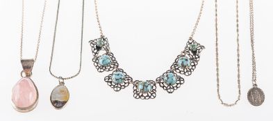 A mixed group of jewellery, including silver and costume jewellery, stone set pendants,