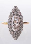 A marquise shaped cluster ring set centrally with an elongated oval-cut diamond, diamond approx. 1.