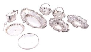 A mixed group of silver comprising: a pair of oval swing handle bon bon dishes, Birmingham 1906,