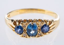 An antique 18ct yellow gold sapphire & diamond ring,
