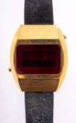 Accurist, a 1970s LED gold-plated wristwatch, the cushion-shaped case with leather strap,