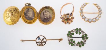 A mixed group of jewellery, including a gold plated oval engraved locket which opens on both sides,