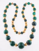 An antique malachite necklace, a string of graduated malachite beads,