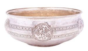 An Arts and Crafts circular bowl by Philip Frederick Alexander, London 1910, hammered body,