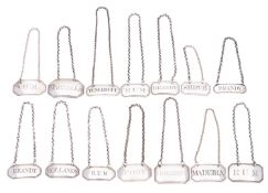 Fourteen silver canted-rectangular wine labels, one by Roger Biggs, London 1798, pierced MADEIRA,