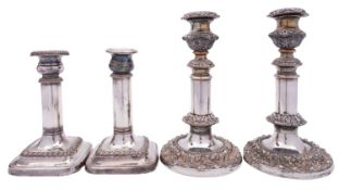 A pair of 19th century Sheffield plated telescopic candlesticks with cast bands of foliage,