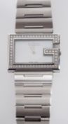 Gucci, a stainless steel and diamond wristwatch, with quartz movement,