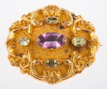 An ornate Victorian mourning brooch,