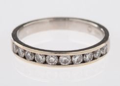 A 9ct white gold half eternity ring, set with brilliant-cut diamonds, diamonds approx. 0.