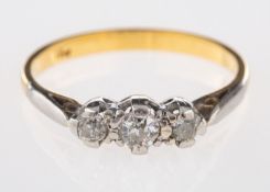 A three stone ring, set with old mine-cut diamonds, diamonds approx. 0.