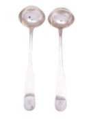 A pair of early 19th century Scottish provincial silver Oar pattern toddy ladles, by David Manson,