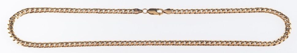 A 9ct yellow gold curb chain, lobster catch, UK import mark, length approx. 45.5cm, 28.8grams.