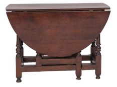 An oak gateleg dining table, early 18th