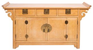 An American bleached oak sideboard, by Raymond K.