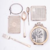 A group of silver comprising of; a cigarette case presented by 'B.