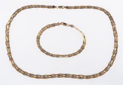 A 9ct three-coloured gold necklace & bra