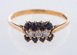 A 9ct yellow gold ring, set centrally wi
