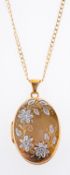 A 9ct yellow gold locket and chain, the