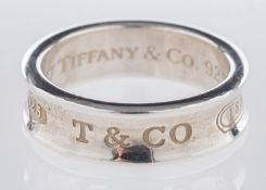 Tiffany & Co. A silver concave style rin