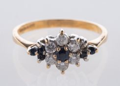 A 9ct yellow gold cluster ring, of flowe