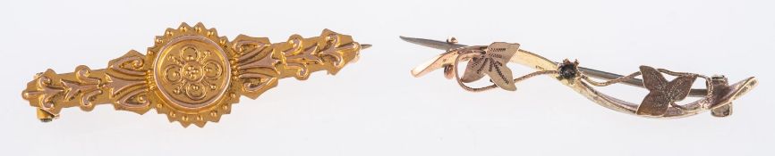 Two 9ct yellow gold brooches, one an orn
